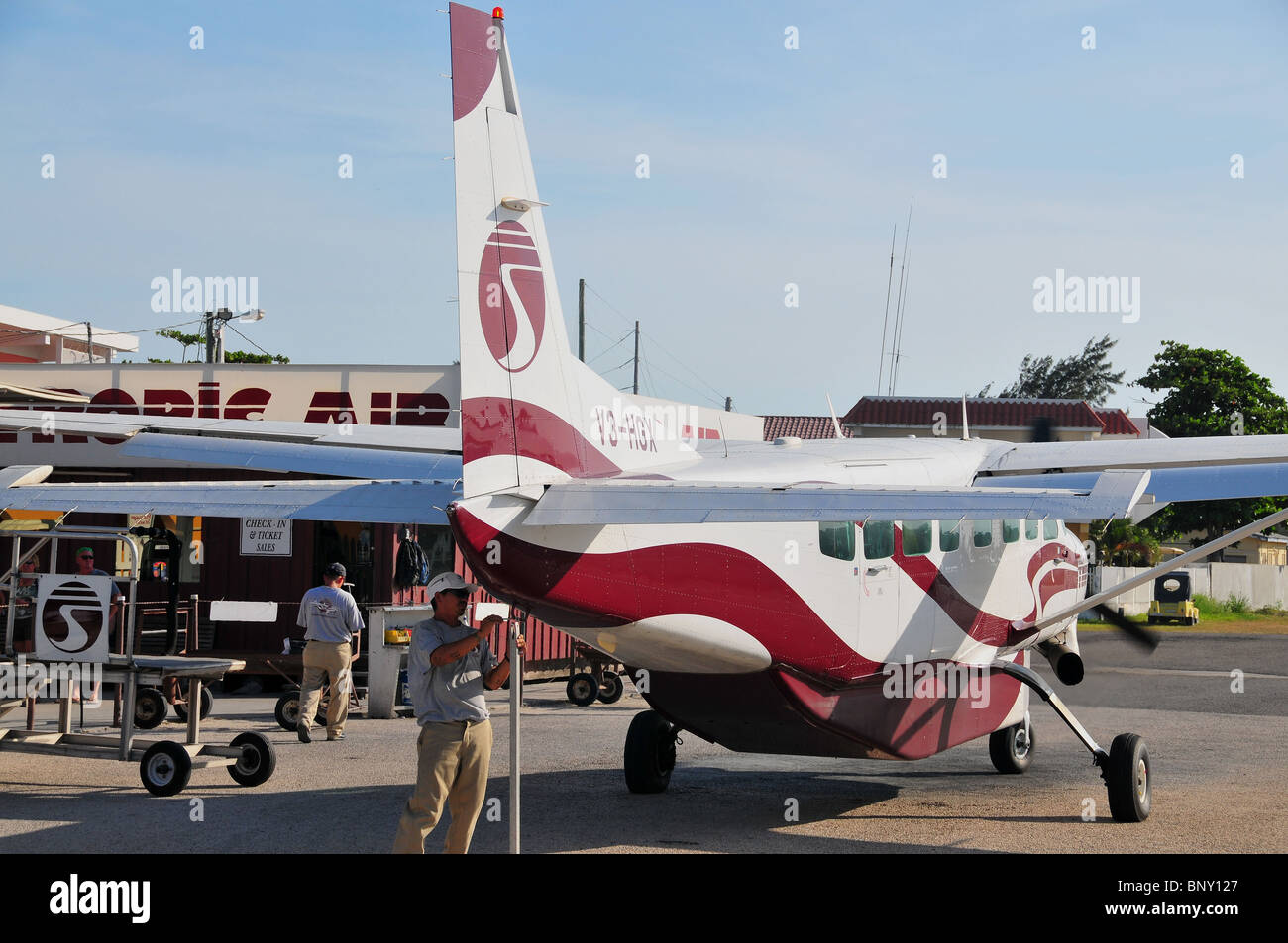 An small Island hopper plane lands at the tiny San Pedro airport on Ambergris  Caye, a top bonefishing/tourism spot in Belize