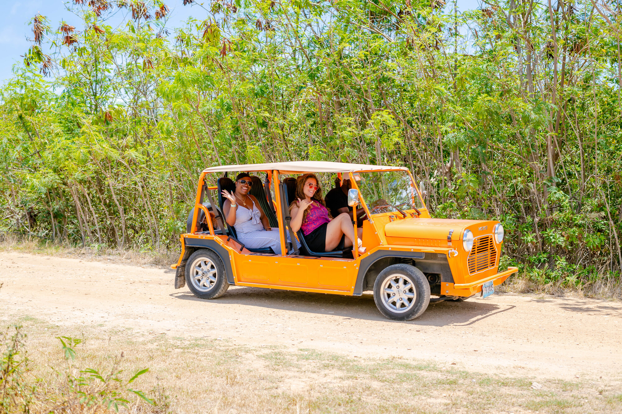 An orange Mini Moke, a popular open-air rental car style in Anguilla