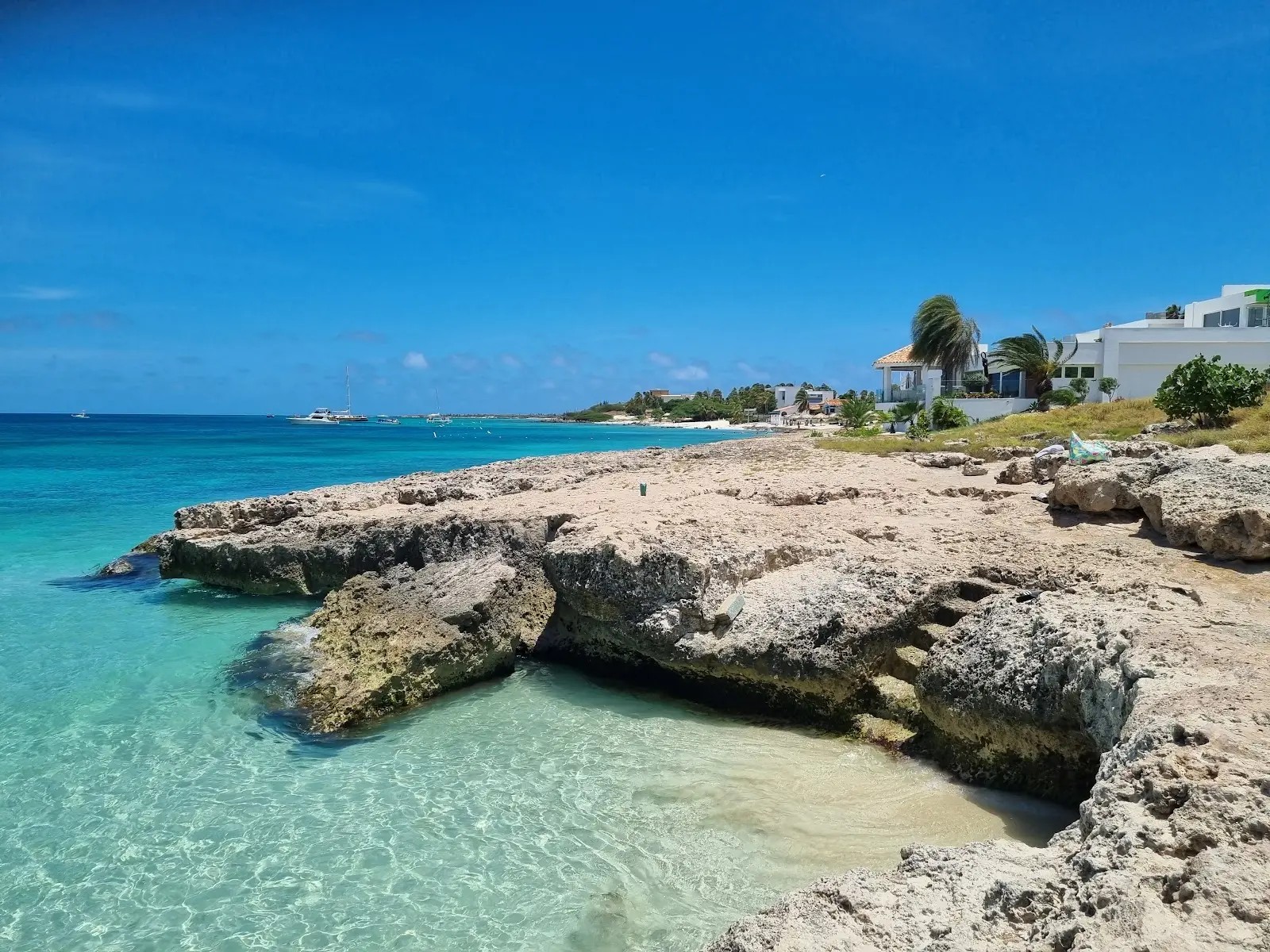 Shallow, clear water over a rocky point at Malmok Beach, Aruba