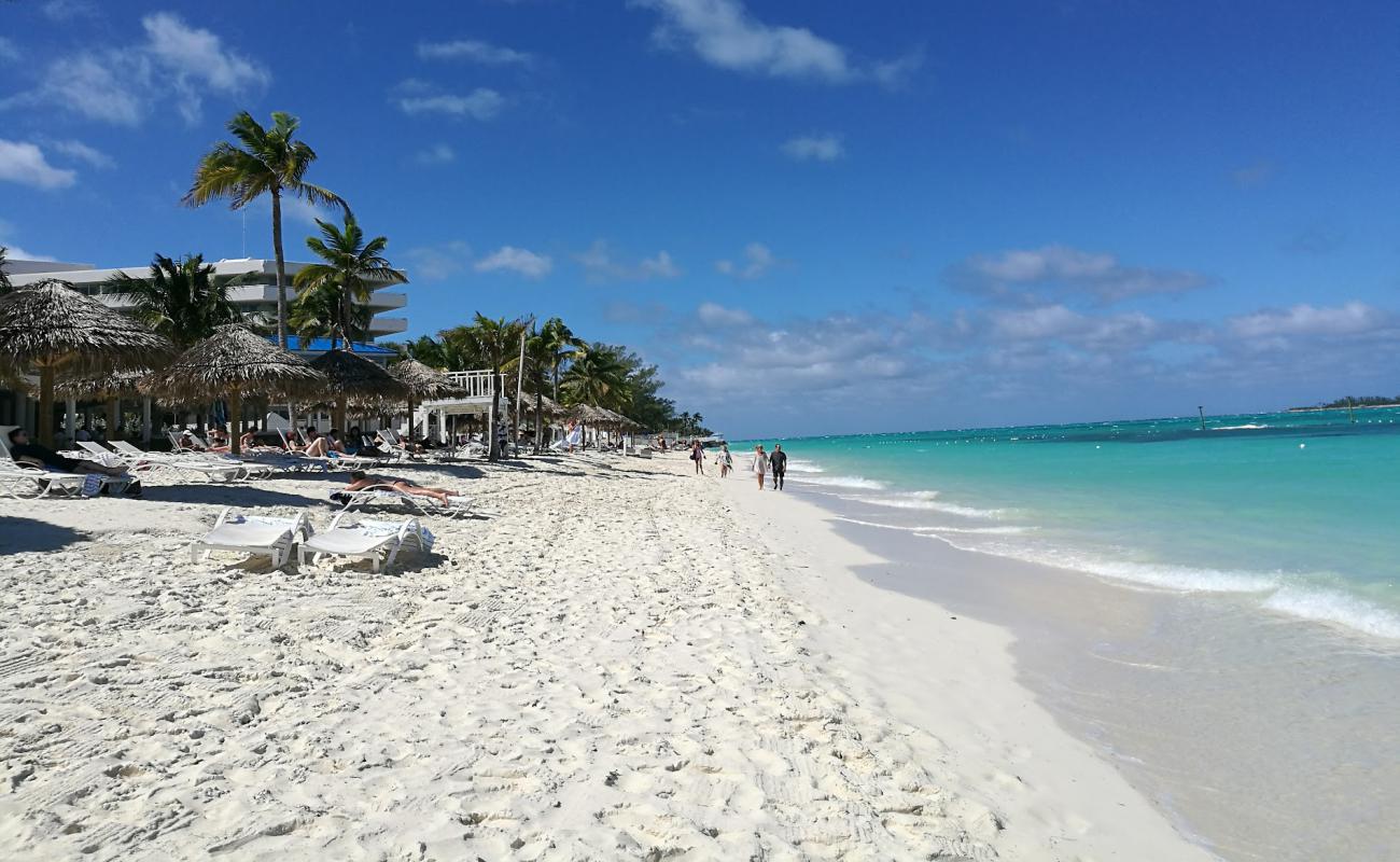 Calm, shallow turquoise water and white sand at Cable Beach in Nassau, Bahamas