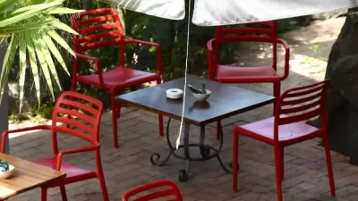 Casual outdoor terrace seating at a lolo, a local grill restaurant in St Martin