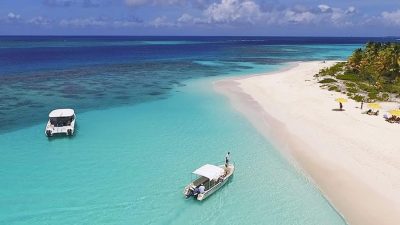 Boats anchored off Shoal Bay, a white sand beach on Anguilla, a short ferry ride from St Martin