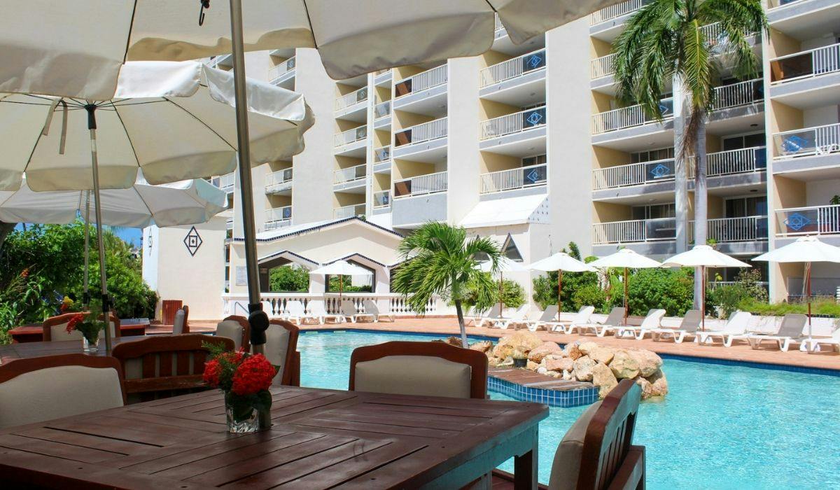 Pool and resort building at Sapphire Beach Club Resort in Sint Maarten
